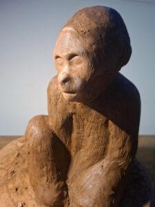 Tradigital clay sculpture of a monkey with 3D printed elements by James Abell Artist Modern art combining traditional sculpting and digital fabrication.